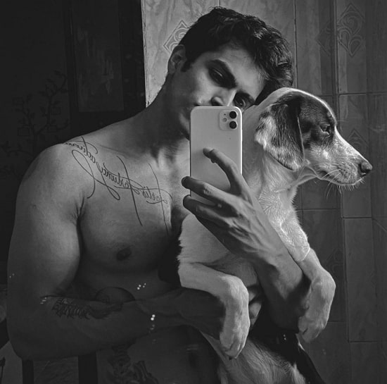trevon dias with his pet dog