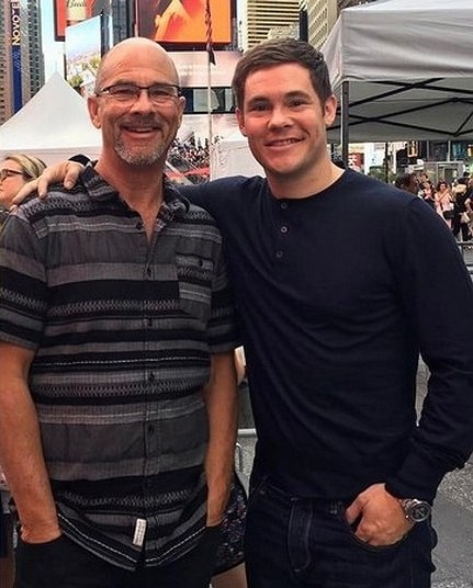 adam devine father