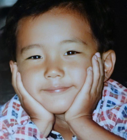 justin h. min childhood pic